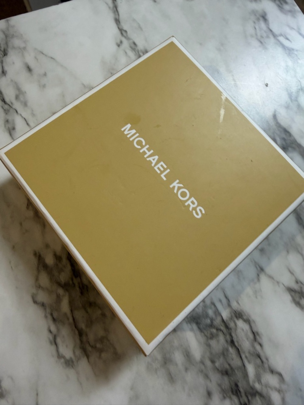 Michael Kors pale ocean colored coaster set